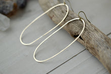 Load image into Gallery viewer, Oval brass hoops, modern hoop earrings, brass jewelry, handmade hoops, brass earrings
