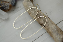 Load image into Gallery viewer, Oval brass hoops, modern hoop earrings, brass jewelry, handmade hoops, brass earrings