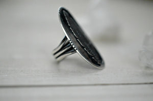Sterling silver feather saddle ring