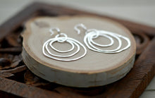 Load image into Gallery viewer, Triple ring silver earrings, sterling silver hoop earrings, hammered silver earrings, dangle

