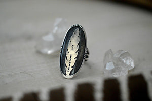Sterling silver feather saddle ring